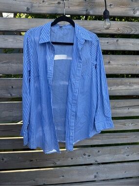 Woman Within Blue and White Striped Button-Down Shirt